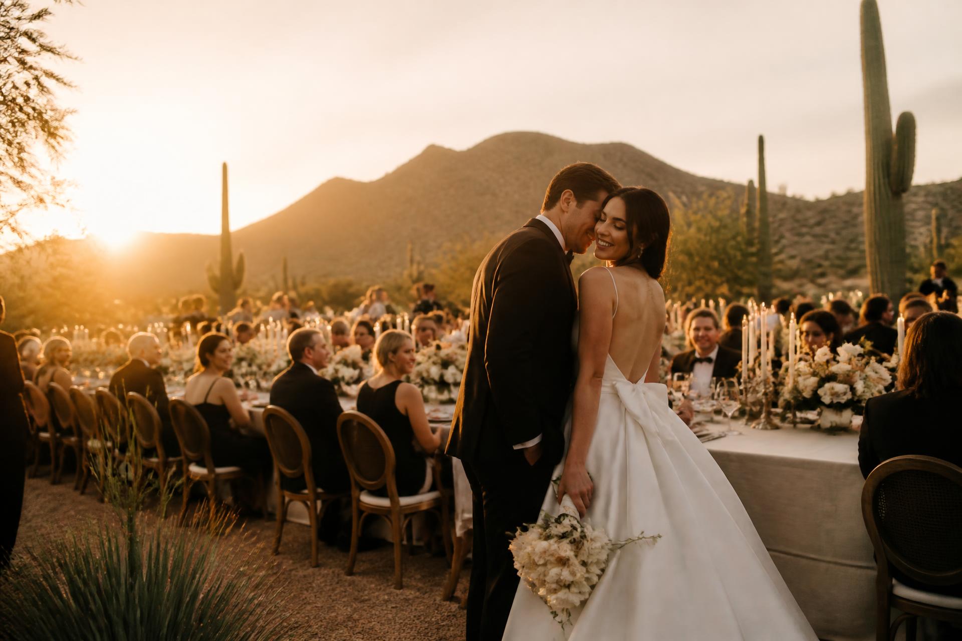 Luxury outdoor wedding reception in Arizona desert at golden hour